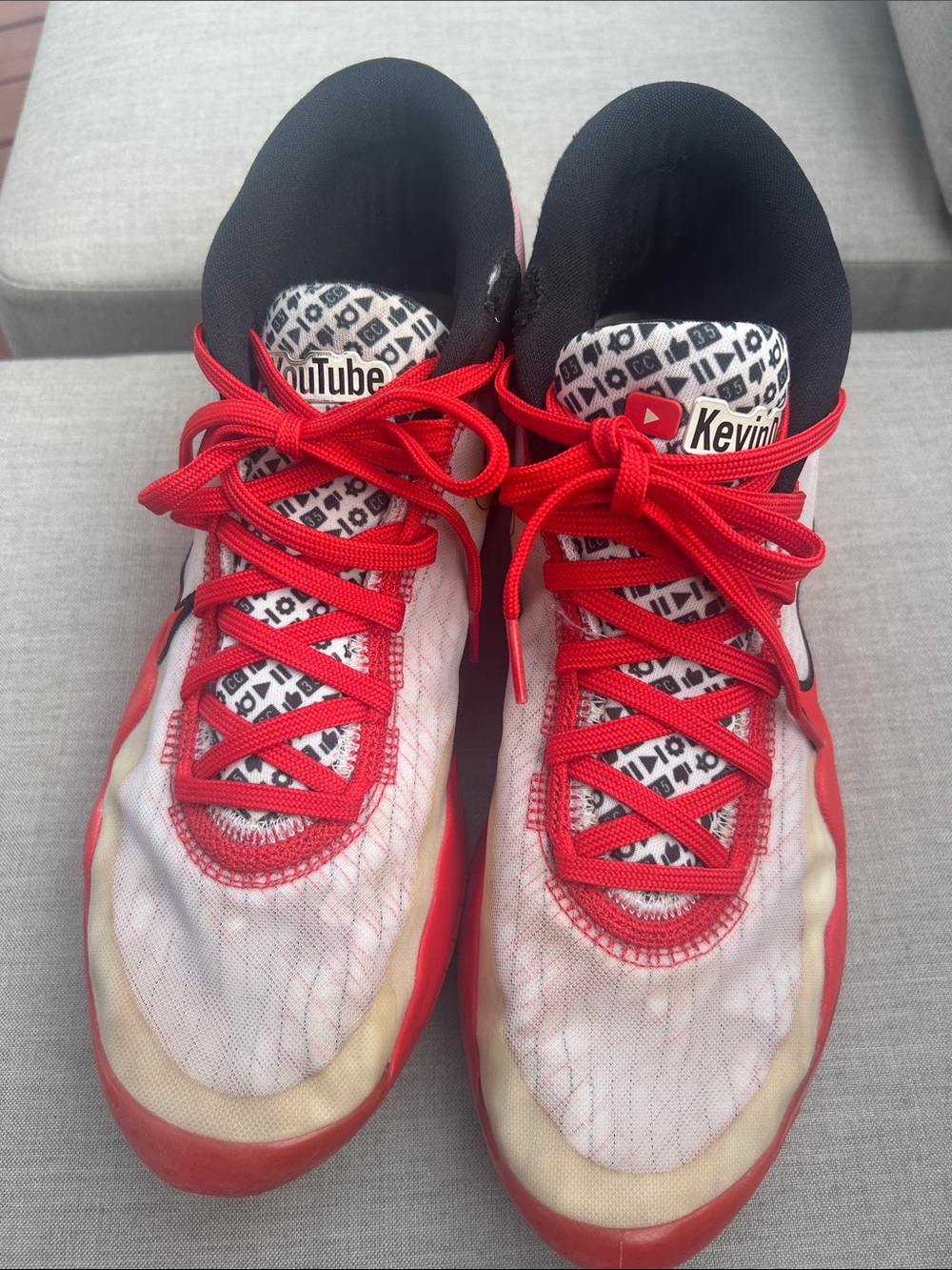 Nike Red and Black Athletic Sneakers with White Tag Detail
